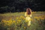 woman in field - yellow dress